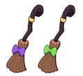 Halloween witch brooms with purple and green ribbon