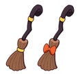 Halloween witch brooms with yellow and orange ribbon