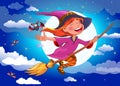 Halloween witch flies on a broomstick Royalty Free Stock Photo