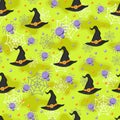 Halloween witch hat and spider seamless pattern on green background. halloween pattern background. Royalty Free Stock Photo