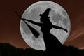 Halloween witch silhouette flying with broomstick. Full Moon. Royalty Free Stock Photo