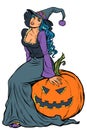 Halloween Witch Sitting On A Pumpkin