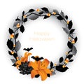 A Halloween floral and twig wreath with bats and candy corn