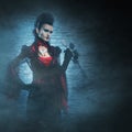 Halloween: a young lady vampire in the dungeon Royalty Free Stock Photo