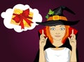 Halloween. Young woman in hat and witch costume crossing