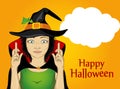 Halloween. A young woman in a hat and a witch suit crossed