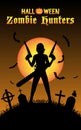 Halloween zombie hunter with handgun at graveyard