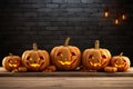 Halloweens 3D pumpkins on a wooden board with jack o lantern charm