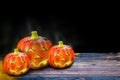 Hallowen pumpkins with shining eyes