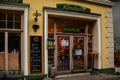 Hallstatt, Austria, 27 August 2021: pastry shop with glass door, Colorful scenic picturesque town street at summer day, mountain