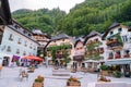 17.07.2020 Hallstatt. Austria. Central Square with flowers and historical architecture in Austria Alps mountain Royalty Free Stock Photo