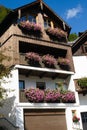 Hallstatt, Austria. Famous mountain village in the Austrian Alps on a warm autumn day. Traditional Austrian wooden houses Royalty Free Stock Photo