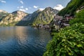 HALLSTATT, AUSTRIA - July, 2019: Scenic picture-postcard view of famous Hallstatt mountain village with Hallstatter See in the Royalty Free Stock Photo