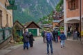 Tourists admire the stunning views of the famous city of Hallstatt.