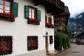 Hallstatt, Austria - 29 Jun 2017 : Alpine houses decorated with flowers and plants