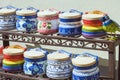 Hallstatt, Austria, September 2019. Bright handmade salted cans on a metal shelf. Austrian souvenirs