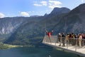 Hallstatt, Austria, September 2019. Tourists take pictures on the Skywalk platform. Beautiful landscapes from the observation deck