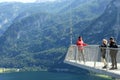 Hallstatt, Austria, September 2019. Tourists take pictures on the Skywalk platform.