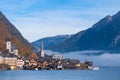 Hallstatt mountain village on a sunny day from classic postcard viewpoint Salzkammergut Austria