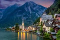 Hallstatt village in Alps and lake at dusk, Austria, Europe