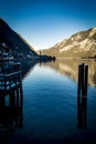 Hallstatt village reflected in lake in the Salzkammergut region of Austria