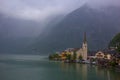 Hallstatter lake and Hallstatt village with cloudy sky in Austrian Alps. Royalty Free Stock Photo