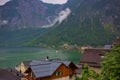 Hallstatter lake and Hallstatt village with cloudy sky in Austrian Alps. Royalty Free Stock Photo