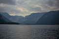 Hallstatter lake near Hallstatt village with cloudy sky in Austrian Alps. Royalty Free Stock Photo