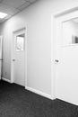 Hallway with closed doors Royalty Free Stock Photo