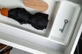 hallway drawer with key, umbrella and clothes brush Royalty Free Stock Photo