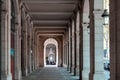 Hallway with geometric columns and diminishing perspective. Walkway arch style. Outdoor dining Royalty Free Stock Photo