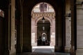 Hallway with geometric columns and diminishing perspective. Walkway arch style. Outdoor dining Royalty Free Stock Photo