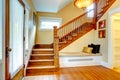 Hallway interior. Old staircase with bench Royalty Free Stock Photo