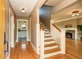 Hallway interior. View of living room with fireplace and kitchen room. Royalty Free Stock Photo