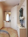 Hallway in modern style with hangers, a mirror dressing table an