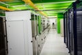 Hallway with a row of servers