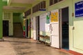 Hallway of rural school Thailand. With shoe rack and bright walls