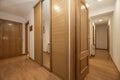 Hallways of a residential home with fitted wardrobes with sliding