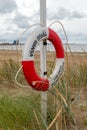 Halmstad city lifebuoy on the seaside beach