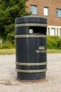 Halmstad, Sweden - August 20, 2022: Halmstad city logo on public trash can