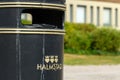 Halmstad city logo on public trash can. Illustrative editorial