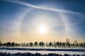 Halo around sun on blue sky in winter time Royalty Free Stock Photo