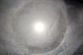 The halo is a circle around the sun as a rare natural phenomenon in the sky. Royalty Free Stock Photo