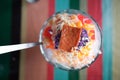 Halo-halo is a colorful Filipino beverage of crushed ice an mixtures of bean, jello, milk and many more