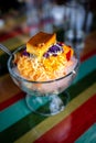 Halo-halo is a colorful Filipino beverage of crushed ice an mixtures of bean, jello, milk and many more