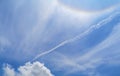 Halo, corona Rainbow refraction Annular sunshine white clouds in the blue sky natural background beautiful nature environment