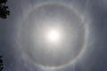 Halo optical phenomenon, circle around the sun Royalty Free Stock Photo