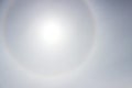 Halo a rainbow around the sun in the afternoon before the weather worsens. Royalty Free Stock Photo