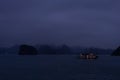 Halong Bay in mystical clouds. Mystical atmoshpere in the world famous halong bay.