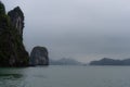 Halong Bay in mystical clouds. Mystical atmoshpere in the world famous halong bay.